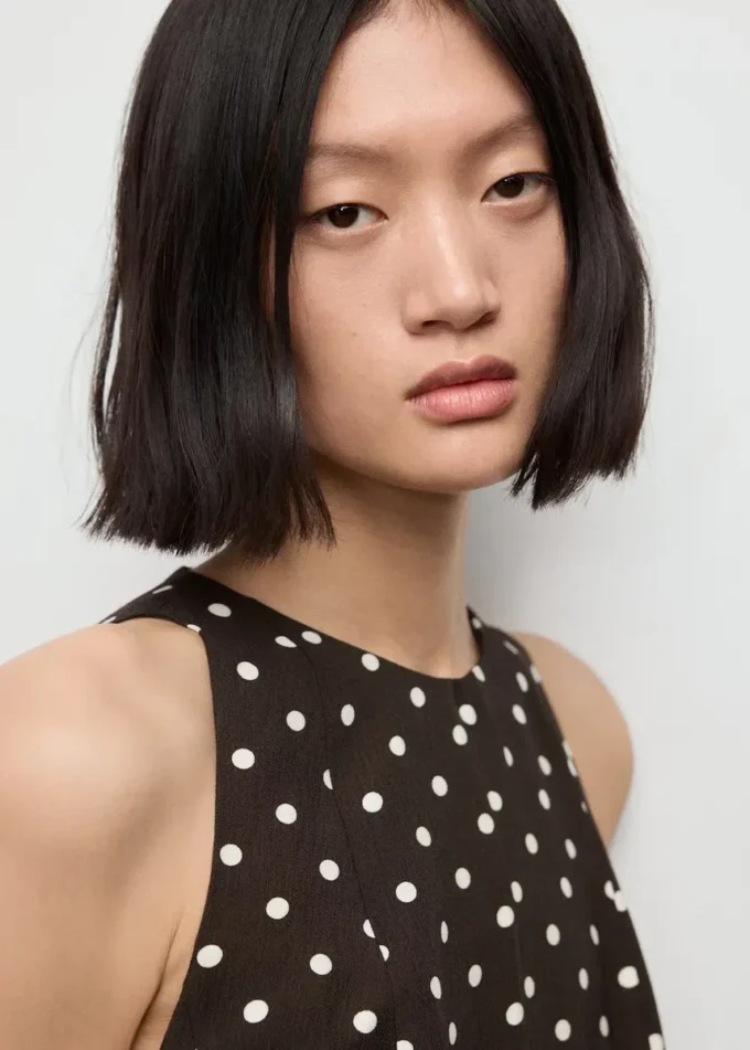 Šaty áčkového střihu s puntíky Šaty áčkového střihu s puntíky