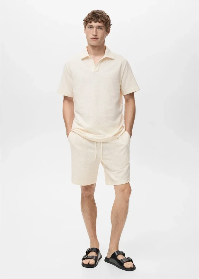 Bavlněné bermudy seersucker se stahovací šňůrkou Bavlněné bermudy seersucker se stahovací šňůrkou