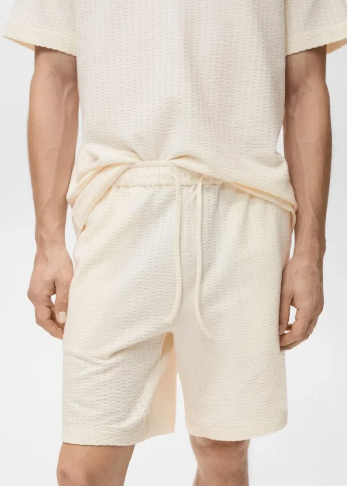 Bavlněné bermudy seersucker se stahovací šňůrkou Bavlněné bermudy seersucker se stahovací šňůrkou