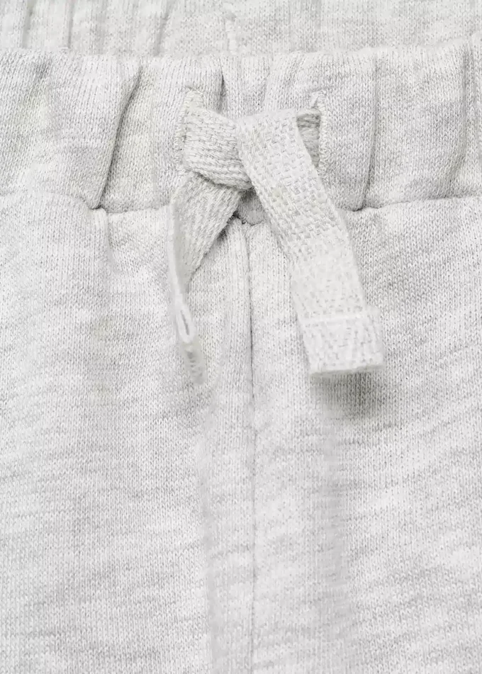 Bavlněné joggingové kalhoty se stahovací šňůrkou Bavlněné joggingové kalhoty se stahovací šňůrkou