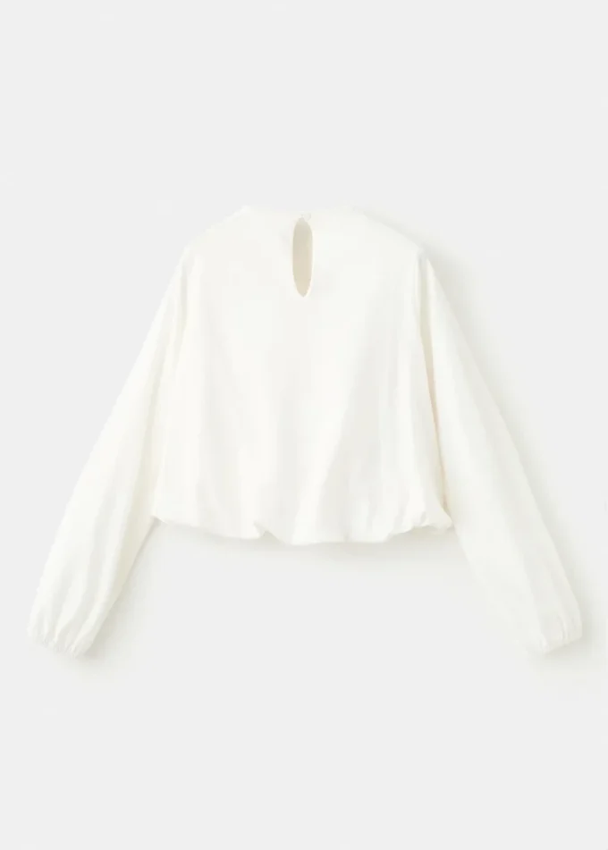 Bavlněné tričko se shromážděným lemem Bavlněné tričko se shromážděným lemem