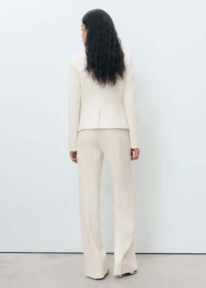 Bouclé sako s kapsami Bouclé sako s kapsami