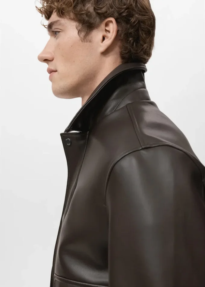 Bunda z umělé kůže s kapsami Bunda z umělé kůže s kapsami