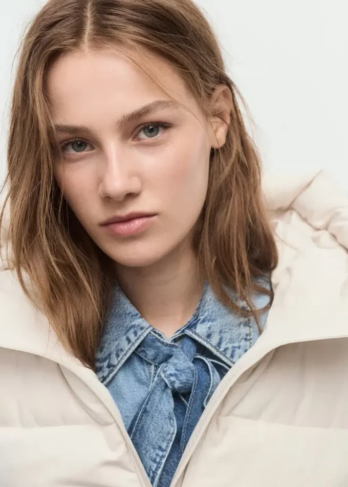 Dlouhá vycpaná bunda s kapucí Dlouhá vycpaná bunda s kapucí