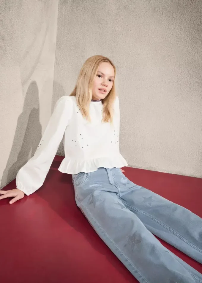 Džíny s detaily v podobě třpytivých hvězd