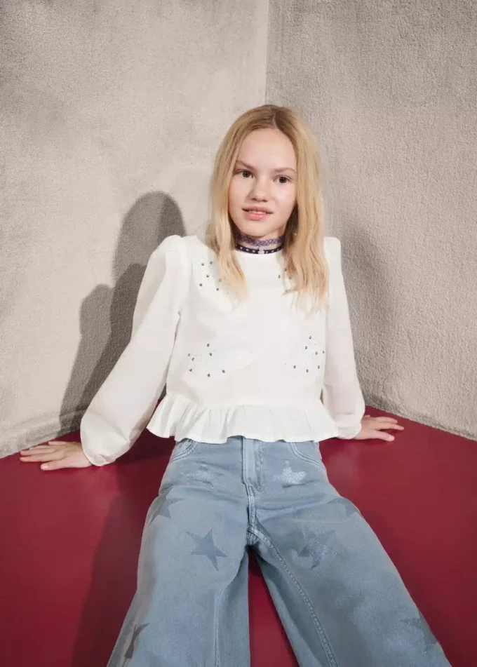 Džíny s detaily v podobě třpytivých hvězd