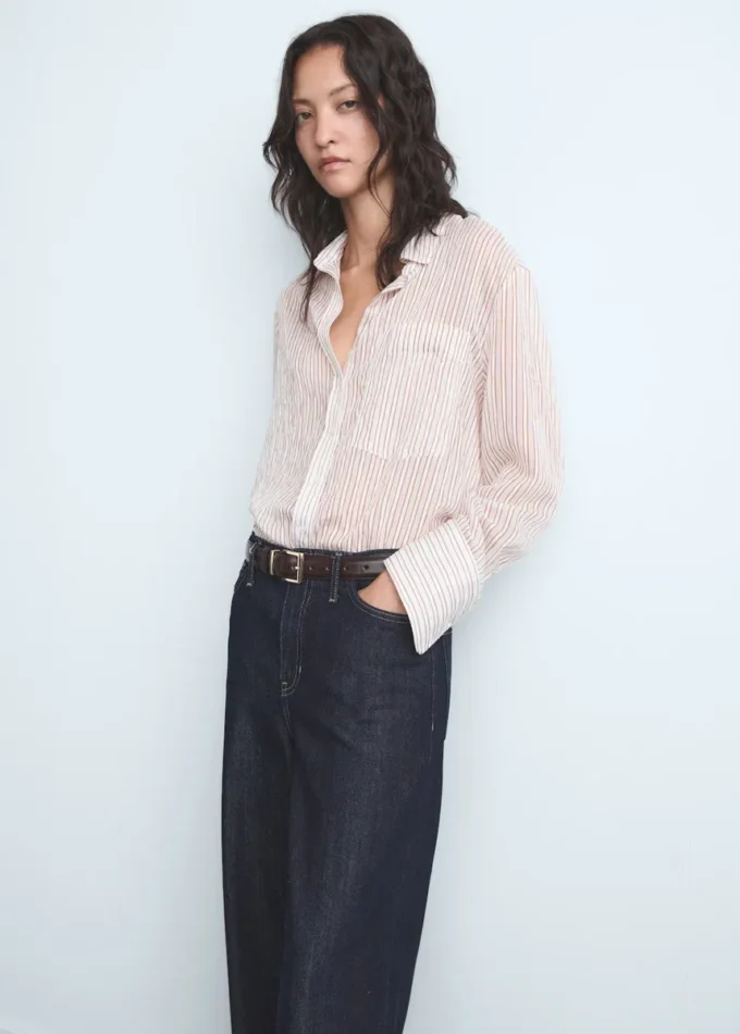 Džíny se širokými nohavicemi a středním pasem Džíny se širokými nohavicemi a středním pasem