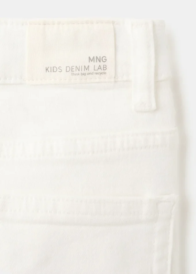 Džíny se středně vysokým pasem a úzkým střihem Džíny se středně vysokým pasem a úzkým střihem