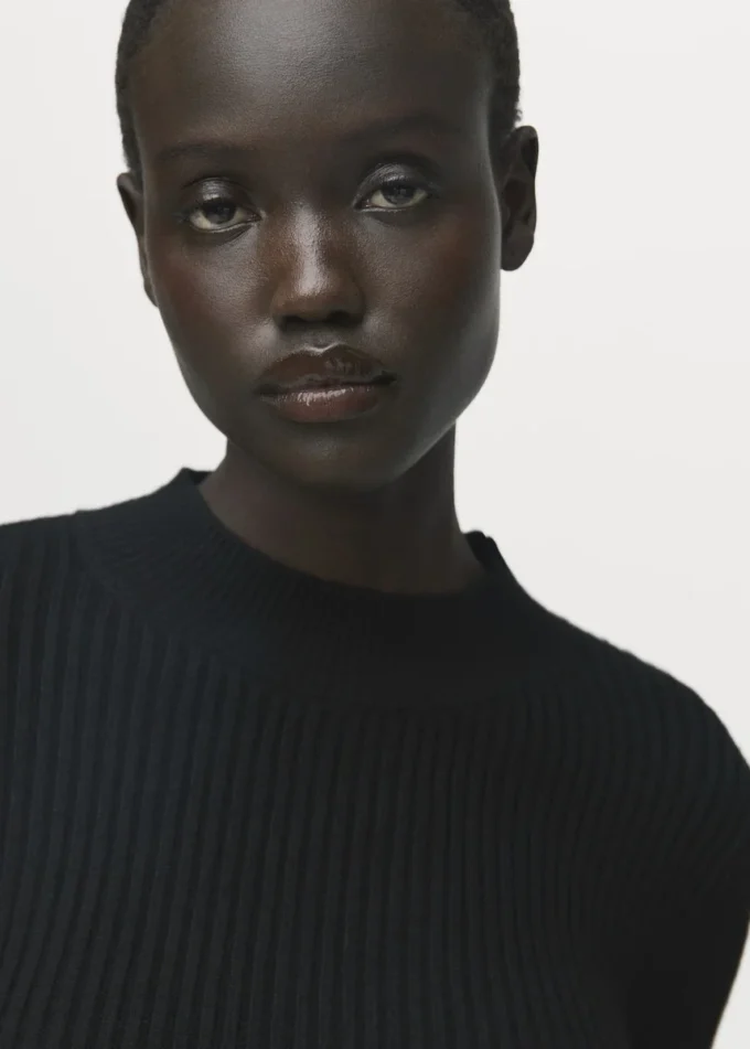 Žebrovaný svetr s peplumem Žebrovaný svetr s peplumem