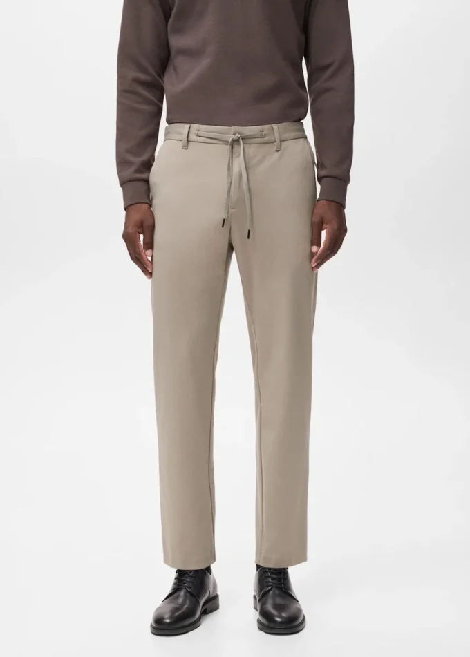 Elastické kalhoty slim fit se stahovací šňůrkou Elastické kalhoty slim fit se stahovací šňůrkou