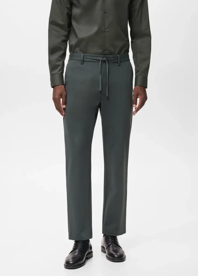 Elastické kalhoty slim fit se stahovací šňůrkou Elastické kalhoty slim fit se stahovací šňůrkou