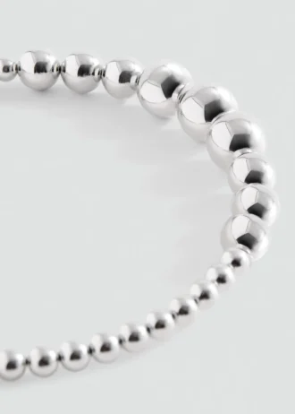 Čelenka s korálkovou aplikací