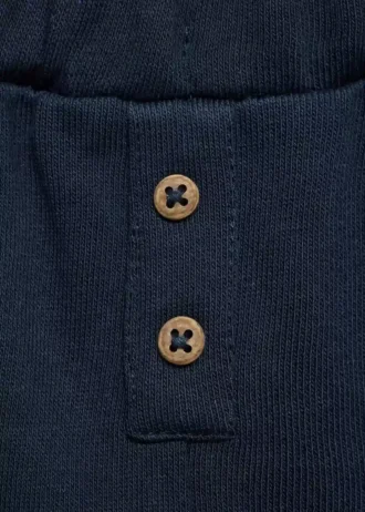 Kalhoty s rovným střihem a knoflíky Kalhoty s rovným střihem a knoflíky