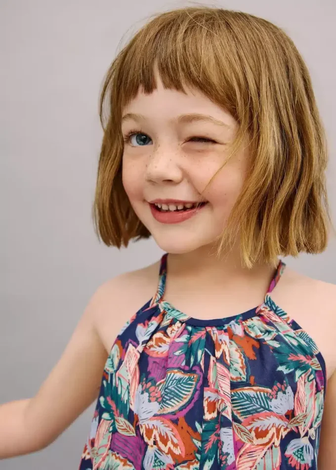 Kombinéza s květinovým potiskem Kombinéza s květinovým potiskem