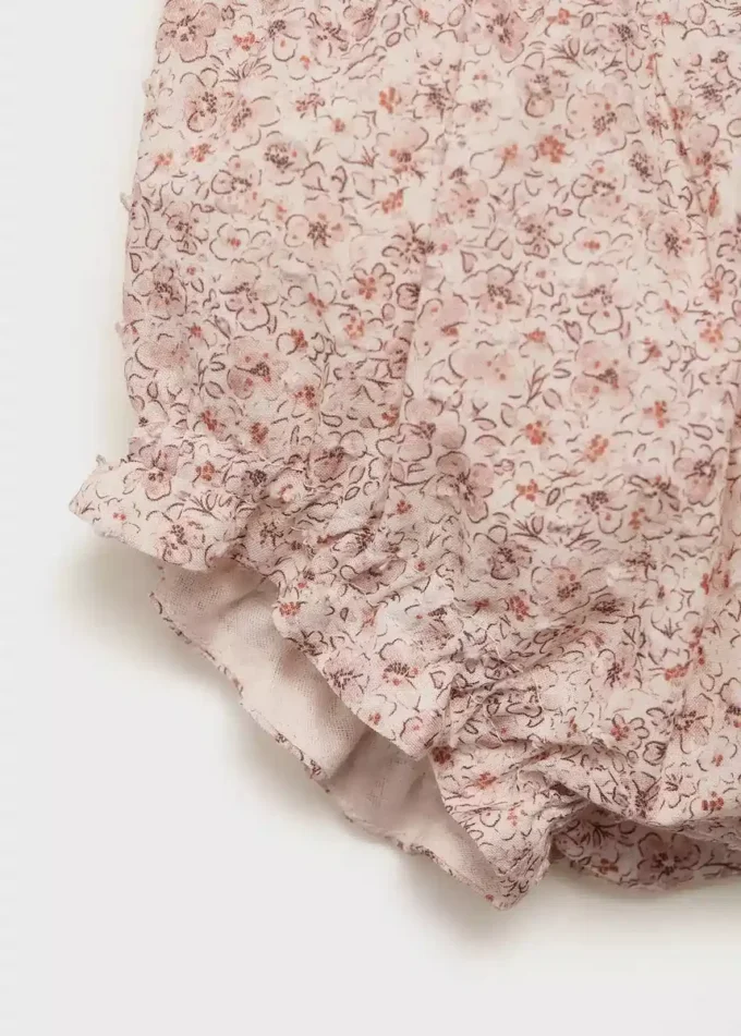 Kombinéza s květinovým potiskem