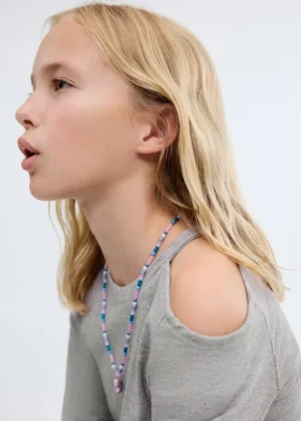 Lurexový top s výřezem