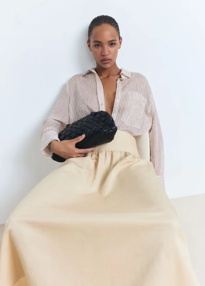 Midi sukně s roztřepenými konci Midi sukně s roztřepenými konci