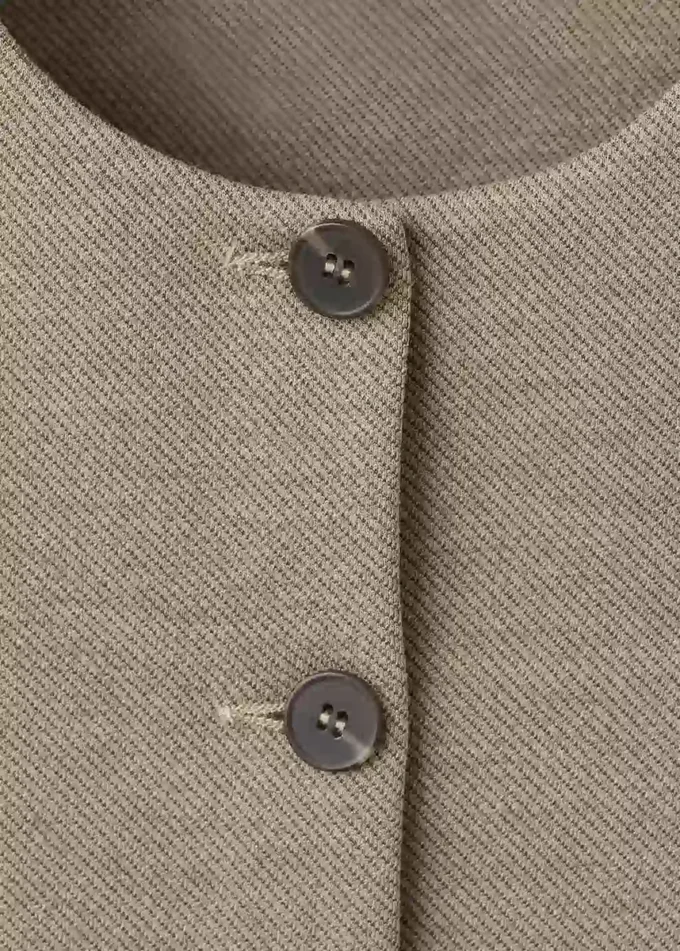 Přiléhavá saková vesta Přiléhavá saková vesta