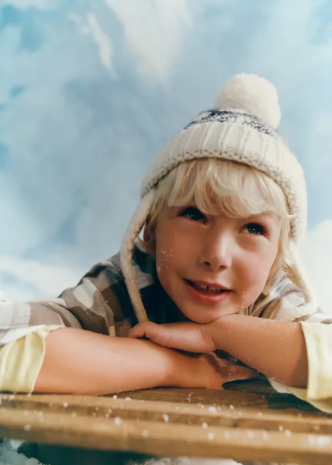 Pletená čepice s bambulí Pletená čepice s bambulí