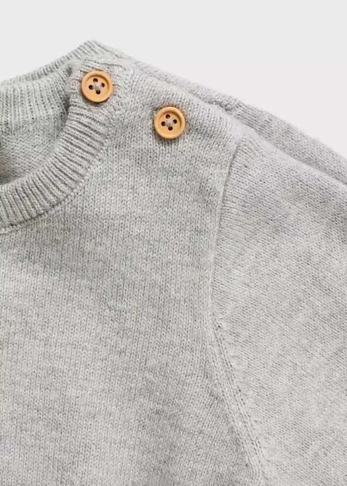 Pletený svetr s kapsami Pletený svetr s kapsami