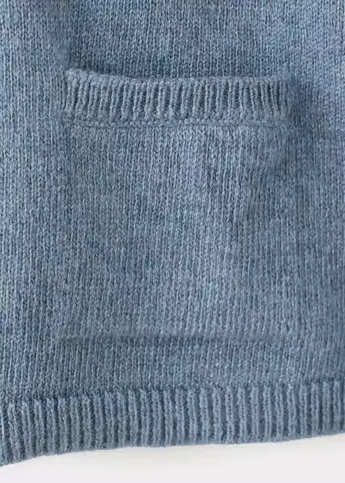 Pletený svetr s kapsami Pletený svetr s kapsami