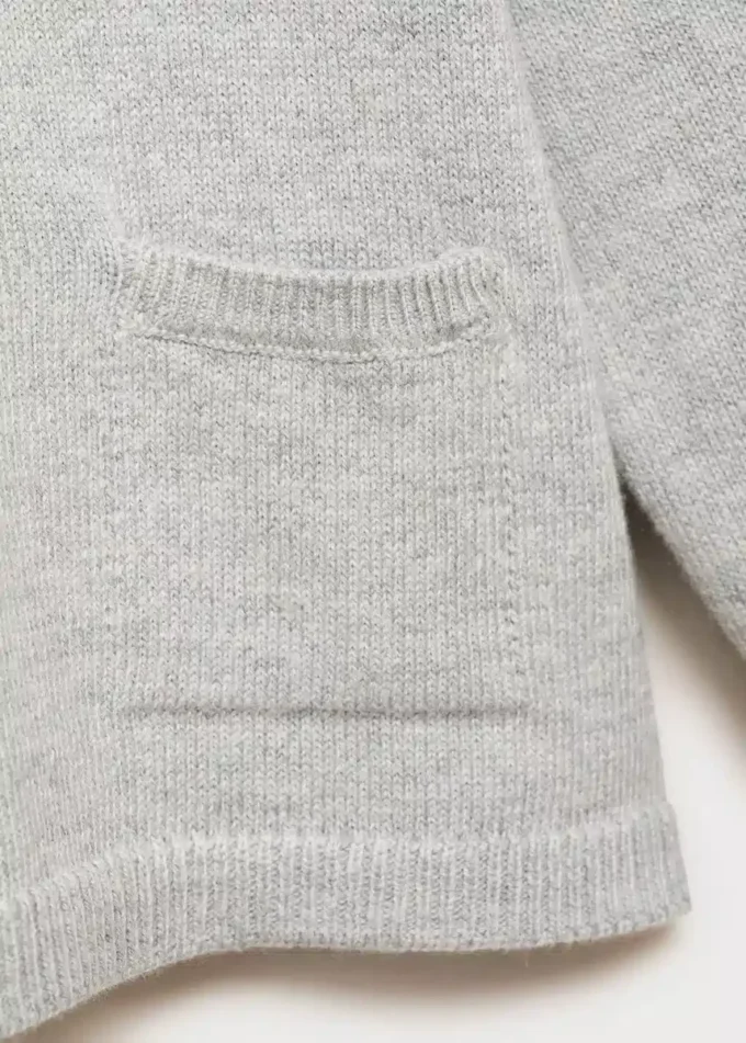 Pletený svetr s kapsami Pletený svetr s kapsami