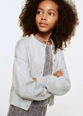 Pletený svetr s lesklými detaily