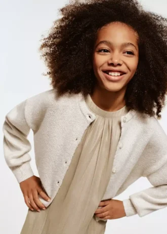 Pletený svetr s lesklými detaily