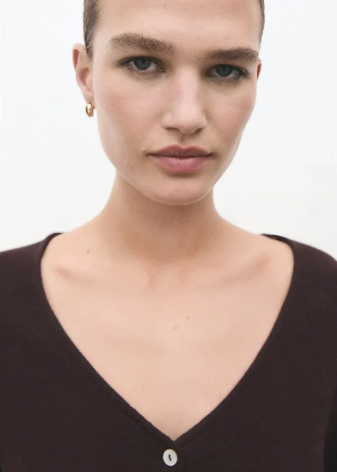 Pletený svetr s mašlí