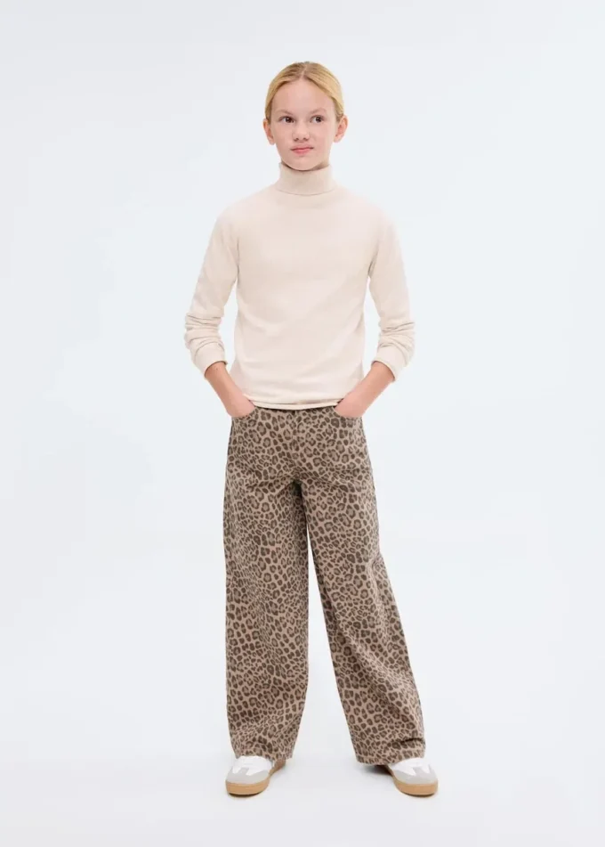 Pletený svetr s rolákem Pletený svetr s rolákem