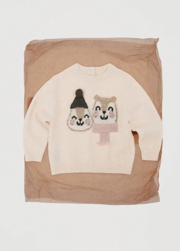 Pletený vyšívaný svetr Pletený vyšívaný svetr