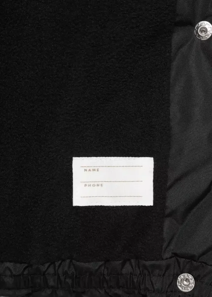 Prošívaný kabát s kapucí Prošívaný kabát s kapucí