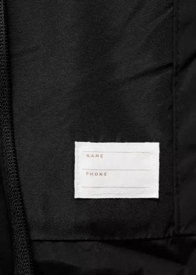 Prošívaná vesta s kapucí Prošívaná vesta s kapucí