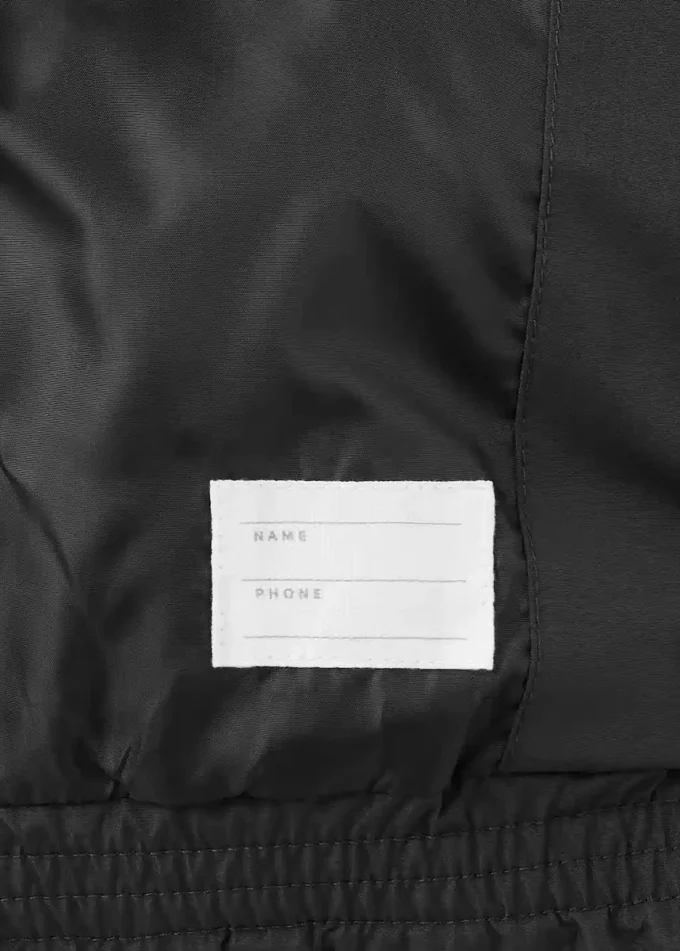 Prošívaná vesta s kapucí Prošívaná vesta s kapucí