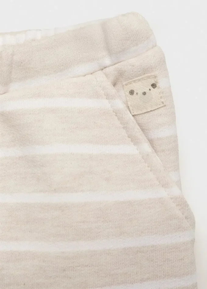 Pruhované joggingové kalhoty se stahovací šňůrkou Pruhované joggingové kalhoty se stahovací šňůrkou