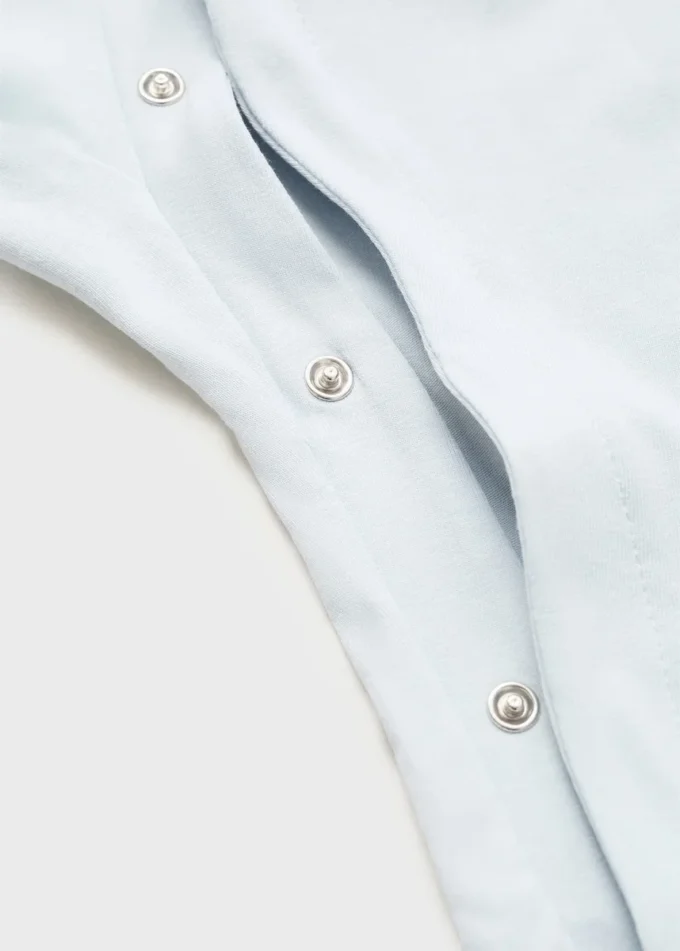 Pyžamo s kapsičkami a kulatým výstřihem Pyžamo s kapsičkami a kulatým výstřihem