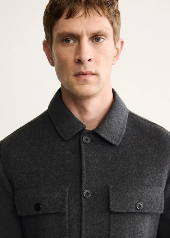 Ručně šitá vlněná bunda s kapsami Ručně šitá vlněná bunda s kapsami