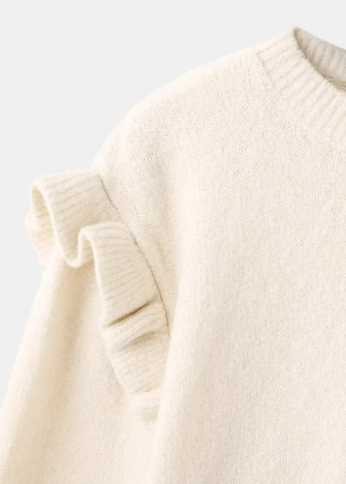 Svetr s volánky a třpytkami Svetr s volánky a třpytkami