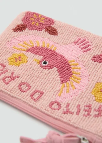 Toaletní taška s korálkovým designem