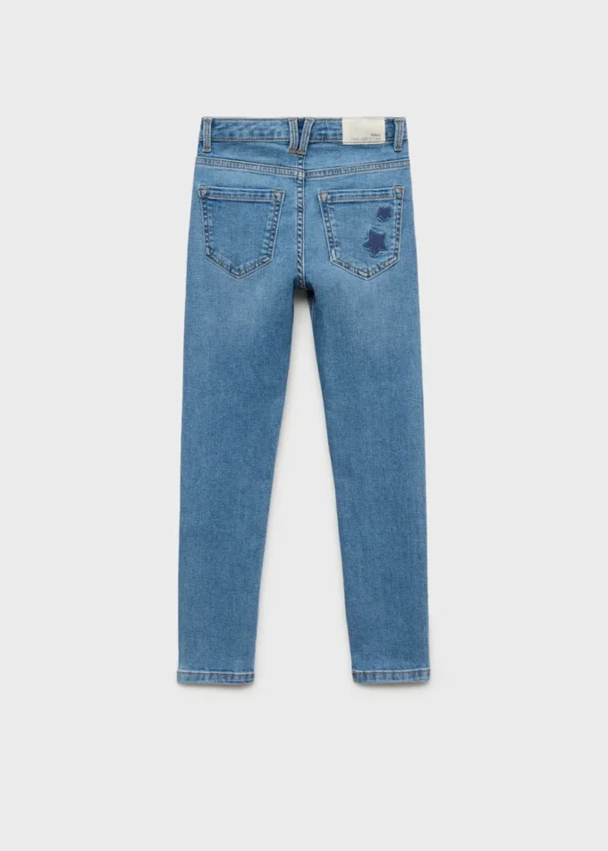 Úzké džíny s vyšívanými hvězdami